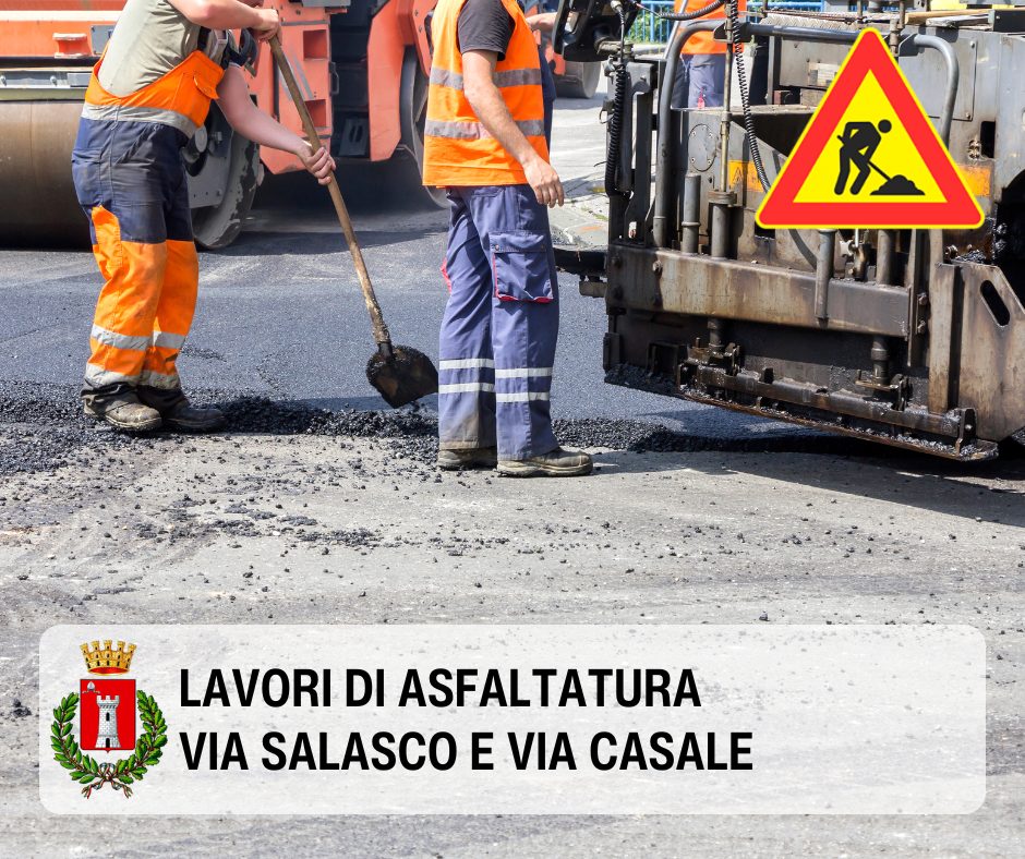 Due operai intervengono su una asfaltatura seguendo la macchina asfaltatrice